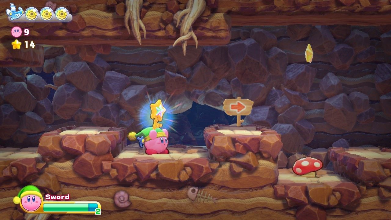 Kirby picks up the key in Cookie Country in Kirby's Return to Dreamland Deluxe.