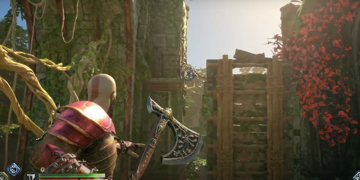 Kratos about to throw axe at clasp holding up draw bridge