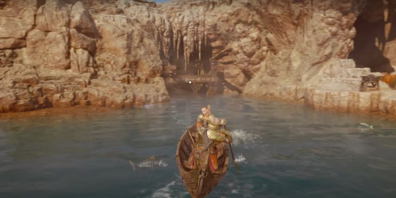 Kratos and Atreus in a boat in the Auvangar Wetlands