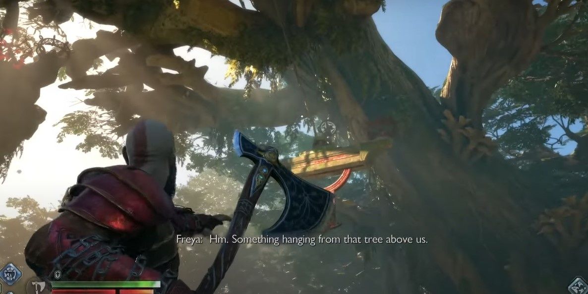 Kratos preparing to throw ax at clasp holding a structure to a tree
