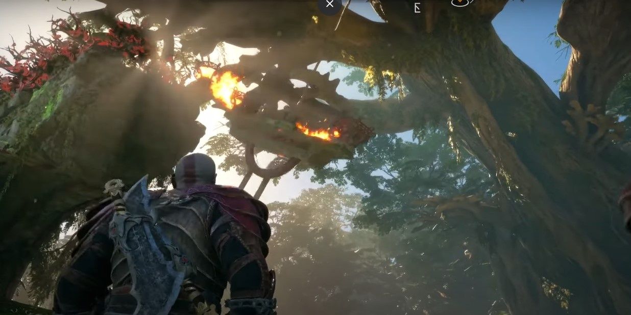 Kratos swinging lit brazer into another brazer to light it