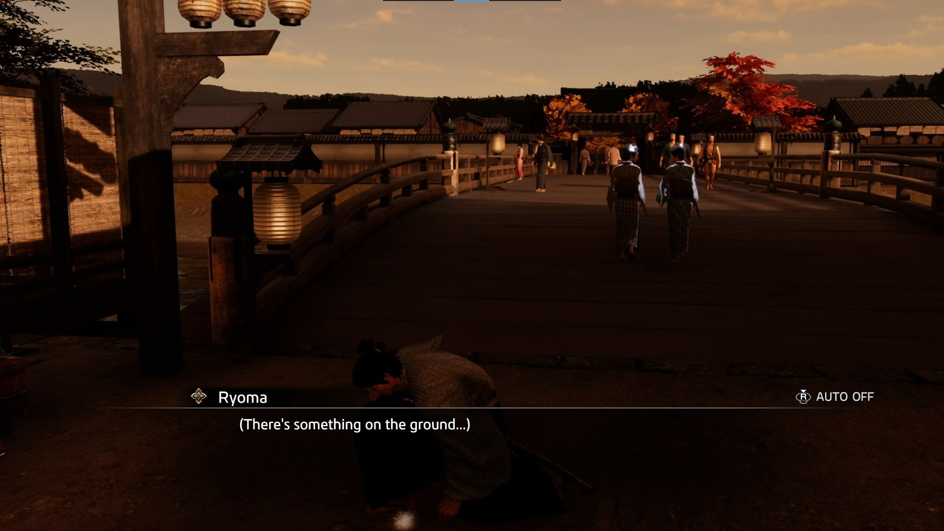 Like A Dragon Ishin, Beginner Tips, Ryoma picking something up from off the ground