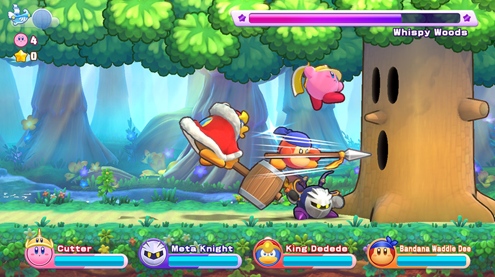 Kirby going up against Whispy Woods in Return to Dream Land Deluxe.