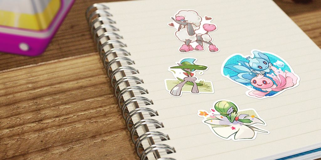 Four different Valentine's Day-themed Pokemon Go Stickers on the page of a notebook