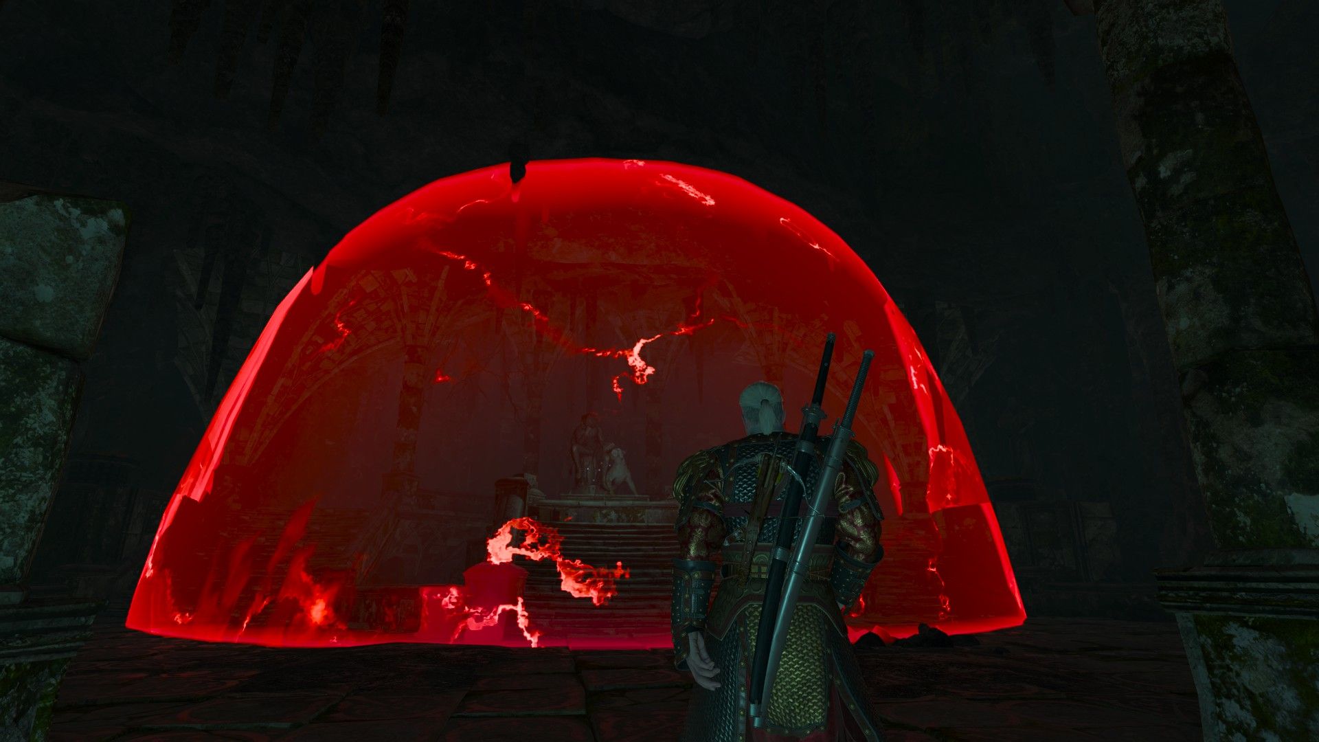 Geralt walks toward a bright, dangerous-looking magic barrier in a dark cave, with a statue in the middle.