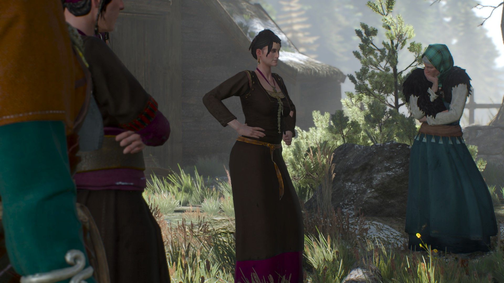 Four women dressed in rustic clothes stand in the shade of a tree in a village in Skellige. They are grieving. 