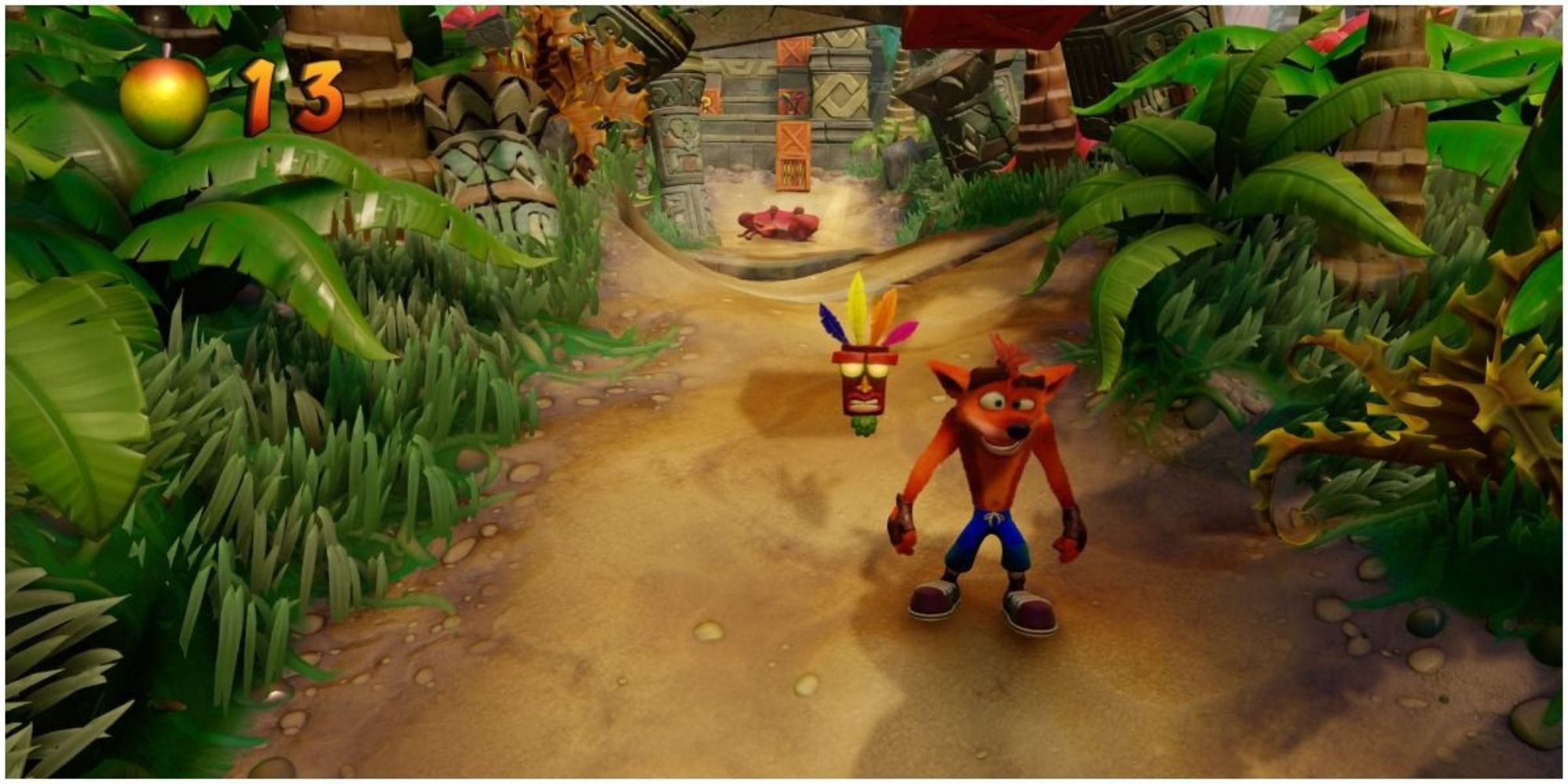 Crash Bandicoot walks down a path with Aku Aku by his side