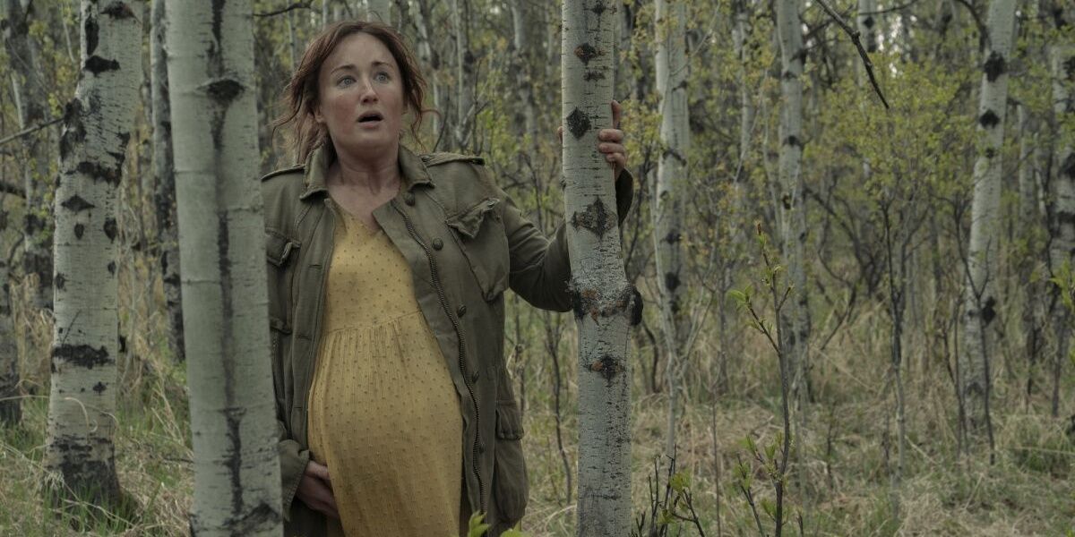 ellie's mother running through the woods from an infected