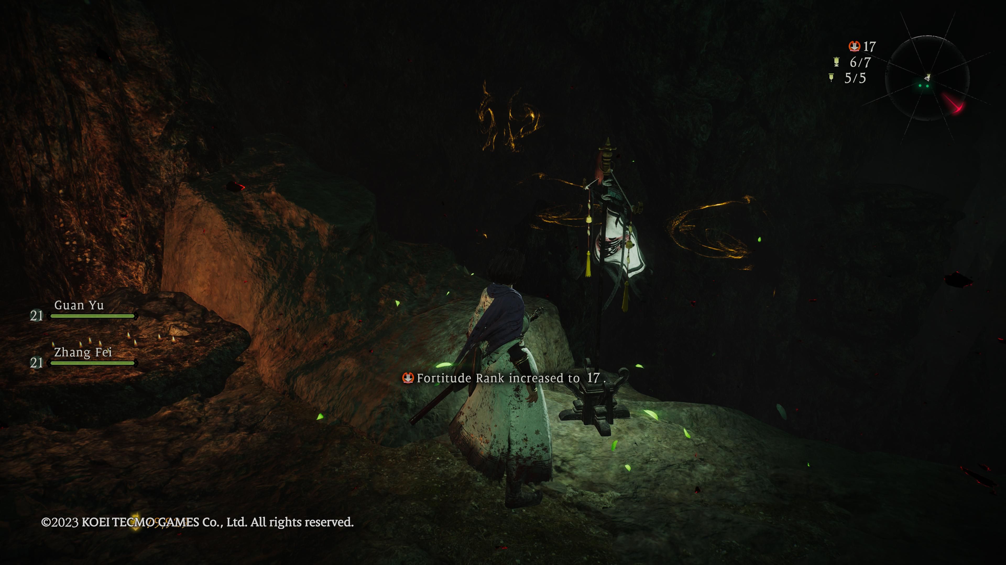 Wo Long: Fallen Dynasty - Our character stands in front of the marking flag found in the cave