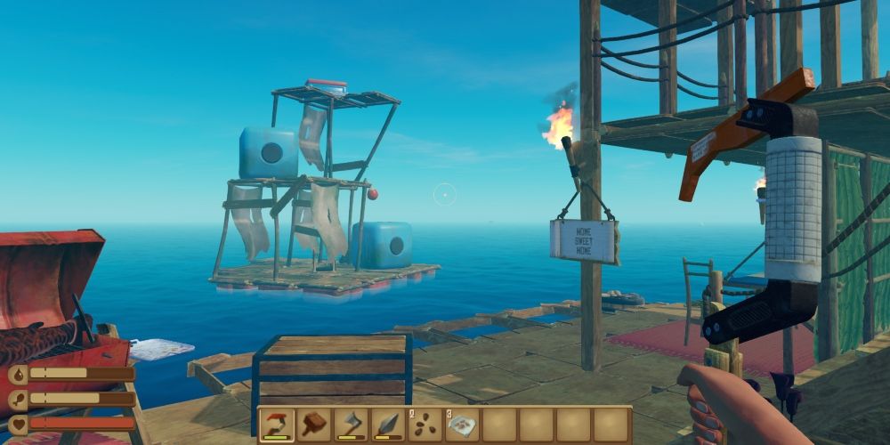 First person perspective of the player holding a hook in their home base and looking at their raft in Raft