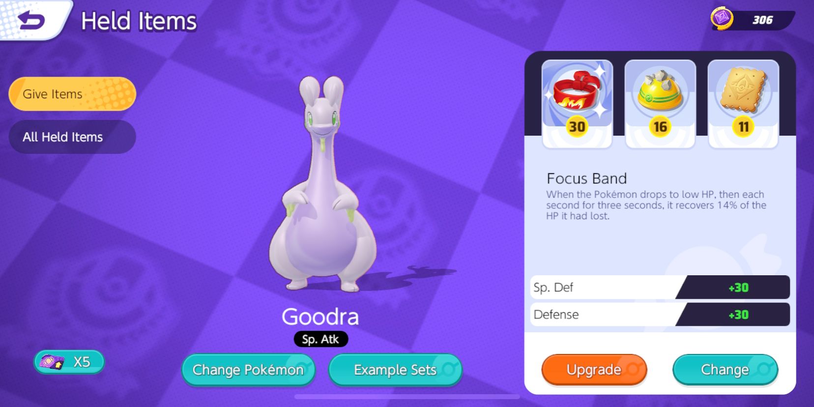 Goodra's Held Item selection screen, with Focus Band, Rocky Helmet, and Aeos Cookie chosen