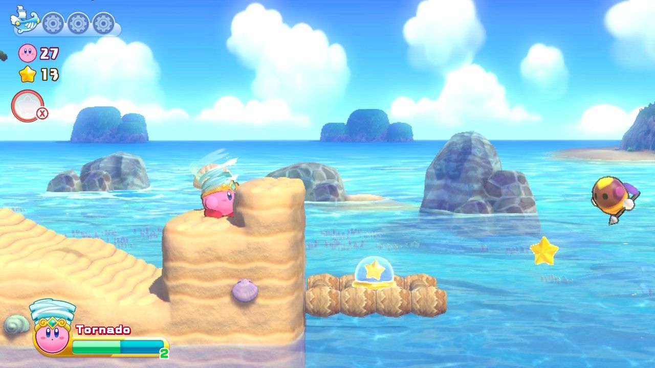 Kirby stand just before a platform and bee enemy in Onion Ocean Stage One