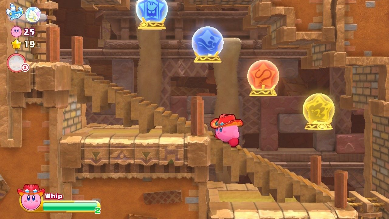 Kirby stands below four Copy Ability choices