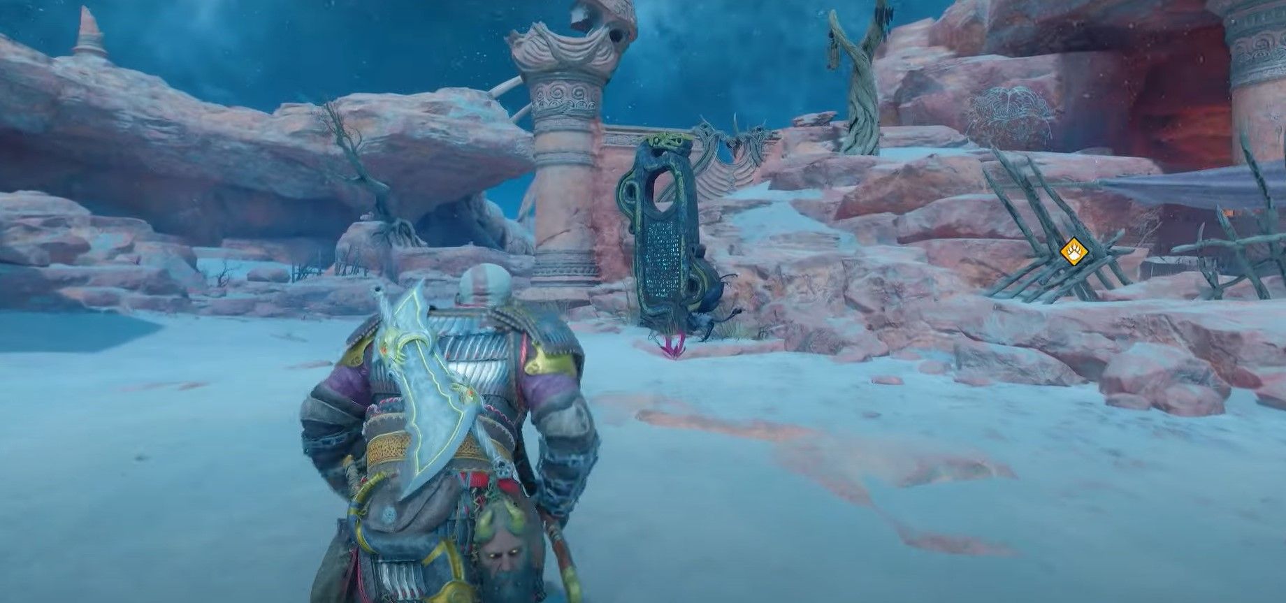 Kratos approaching Lore Marker in the Canyons