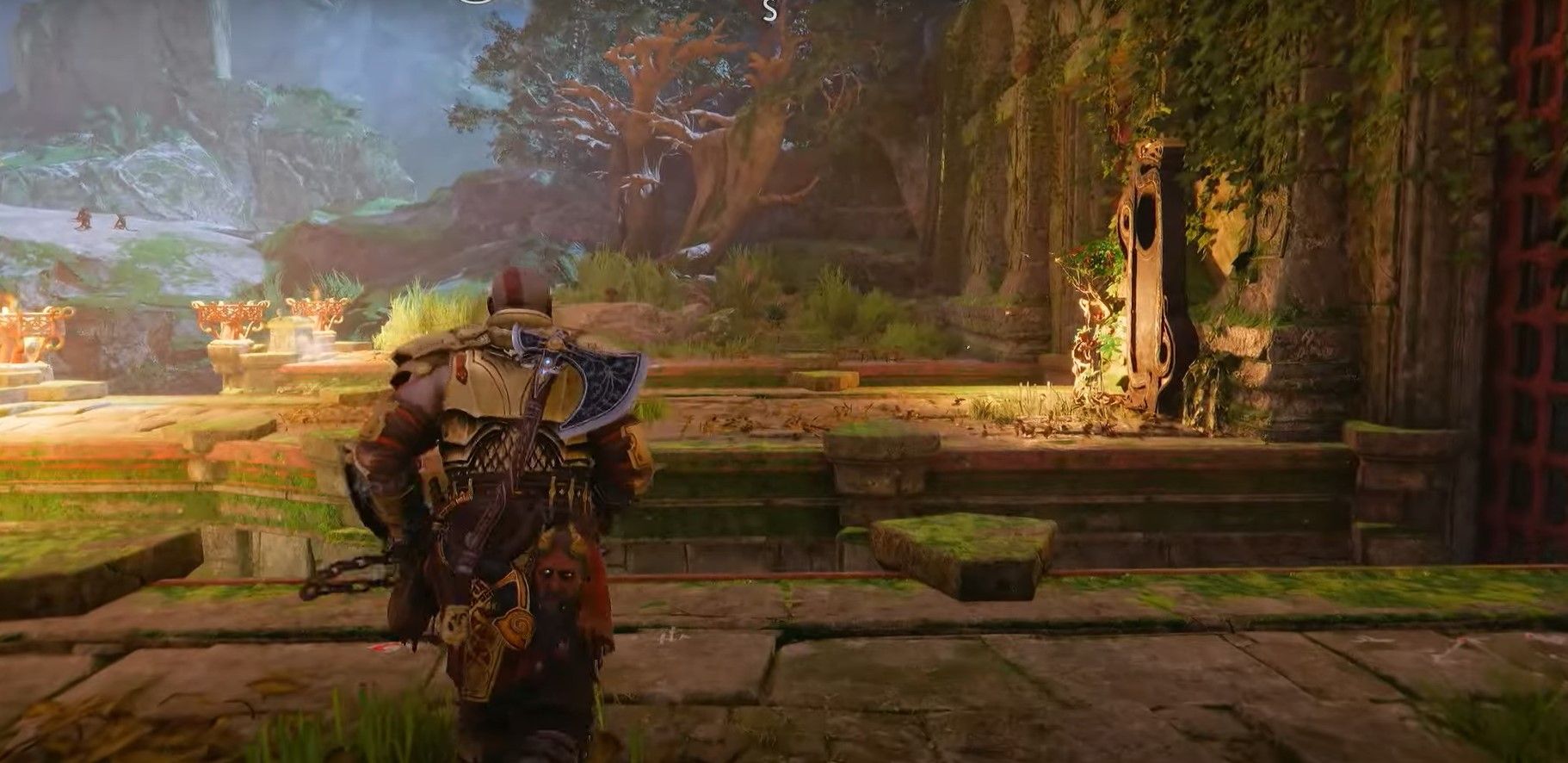 Kratos approaching the Lore Marker near the Dam