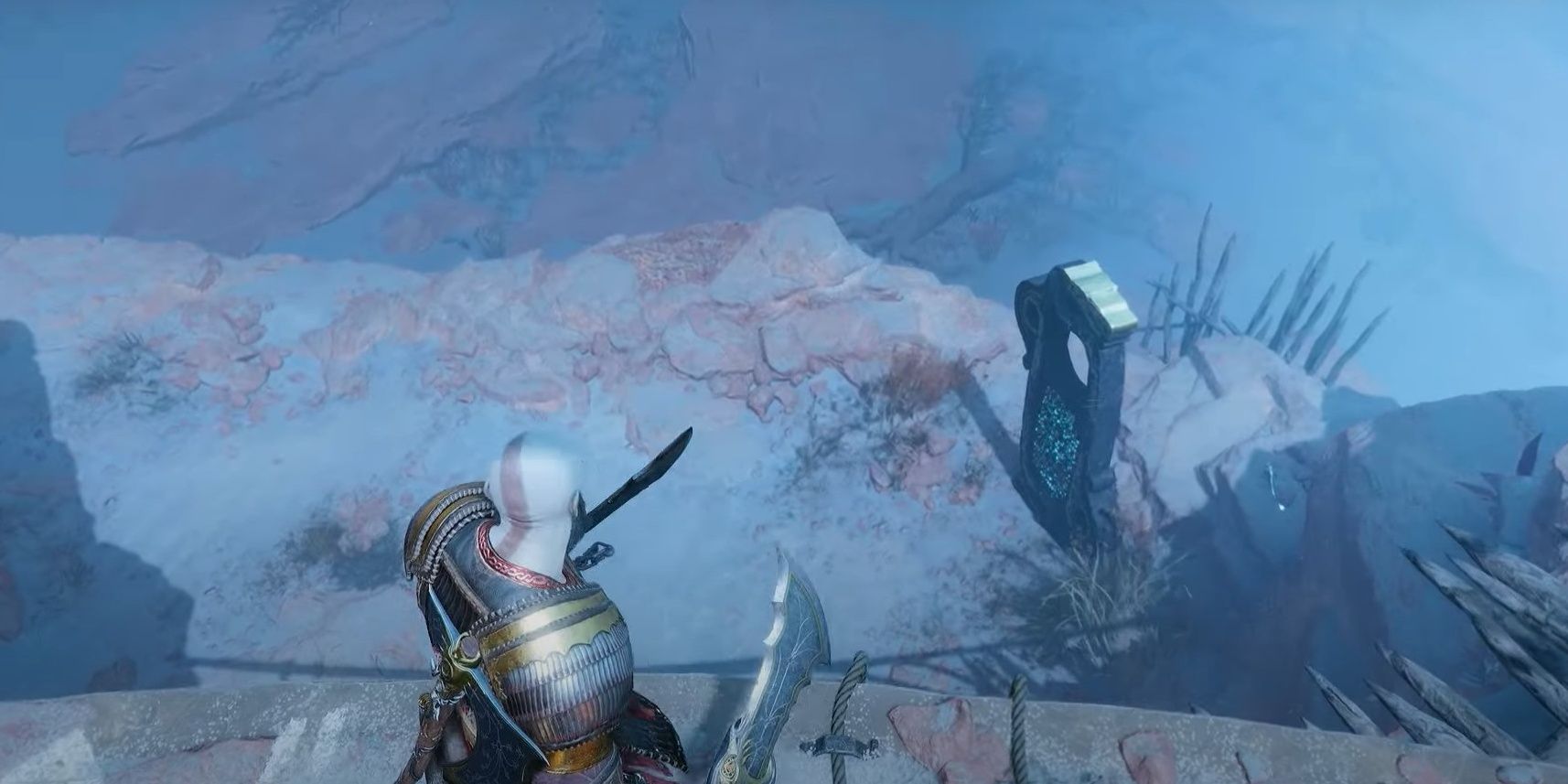 Kratos looking down at Lore Marker