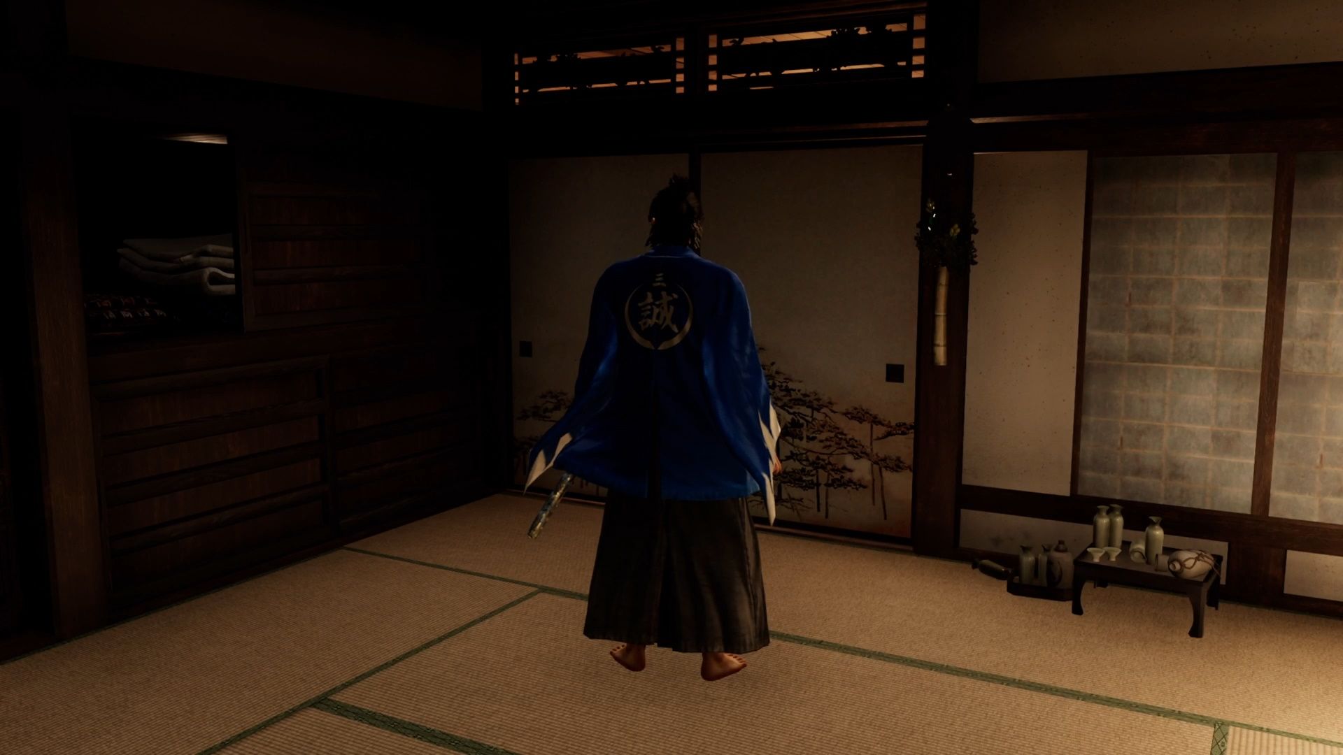 Like A Dragon Ishin, Ryoma standing in his room in the Teradaya
