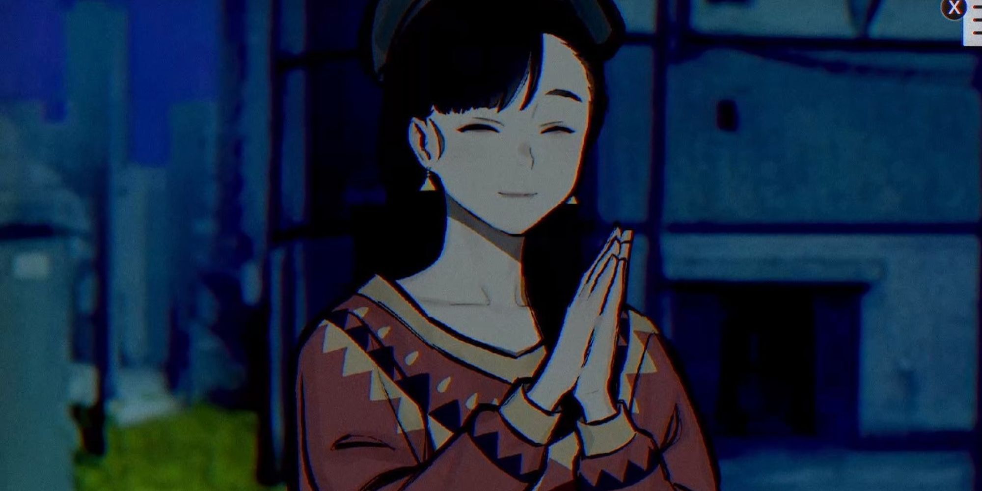 Ayame Tono puts her hands together outside at night
