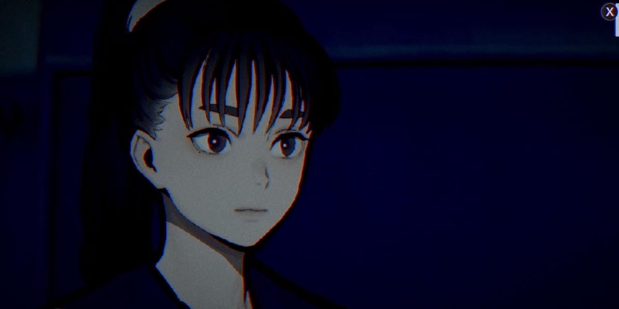 Yakko Sakazaki sits in a dark classroom