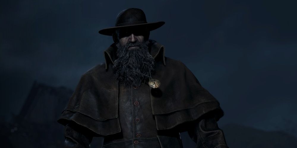 Village Chief Bitores Mendez on the loading screen of Resident Evil 4 Remake, with a hat partially concealing his face.
