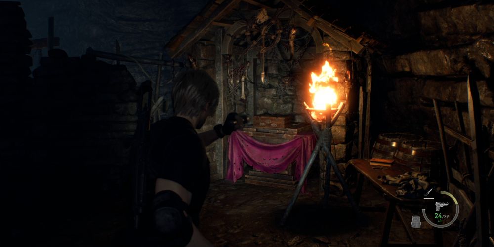 leon kennedy finds the box containing the old wayshrine key at the mural cave in resident evil 4 remake
