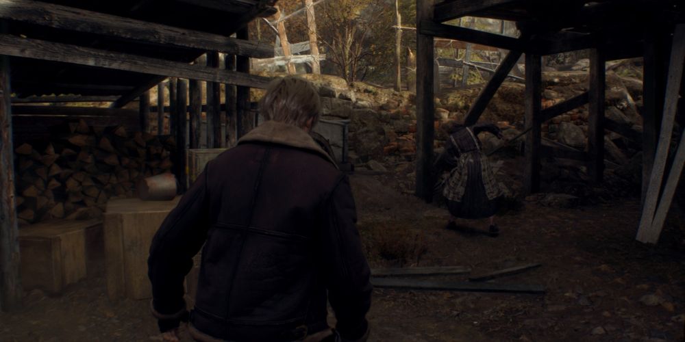 leon kennedy approaches an unaware enemy in resident evil 4 remake