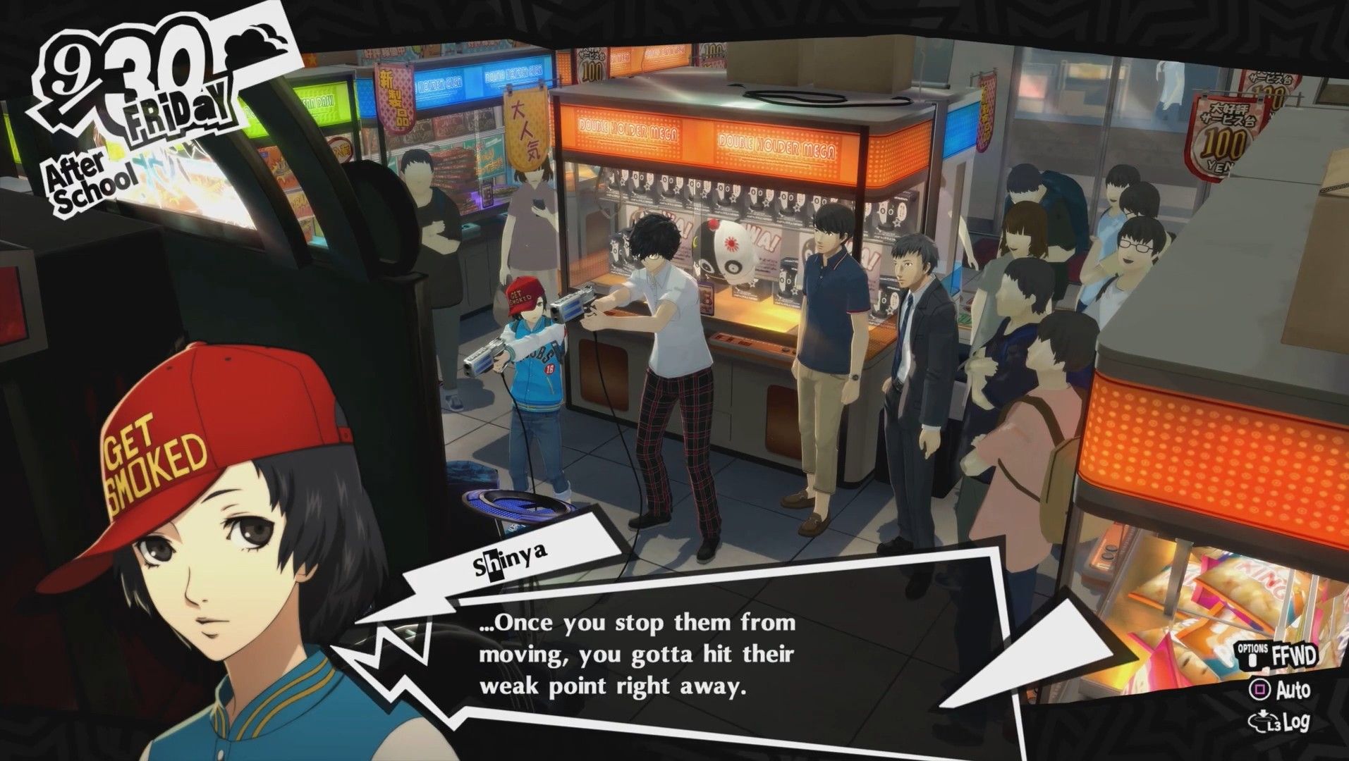 shinya giving joker some shooting tips in the akihabara arcade in persona 5 royal