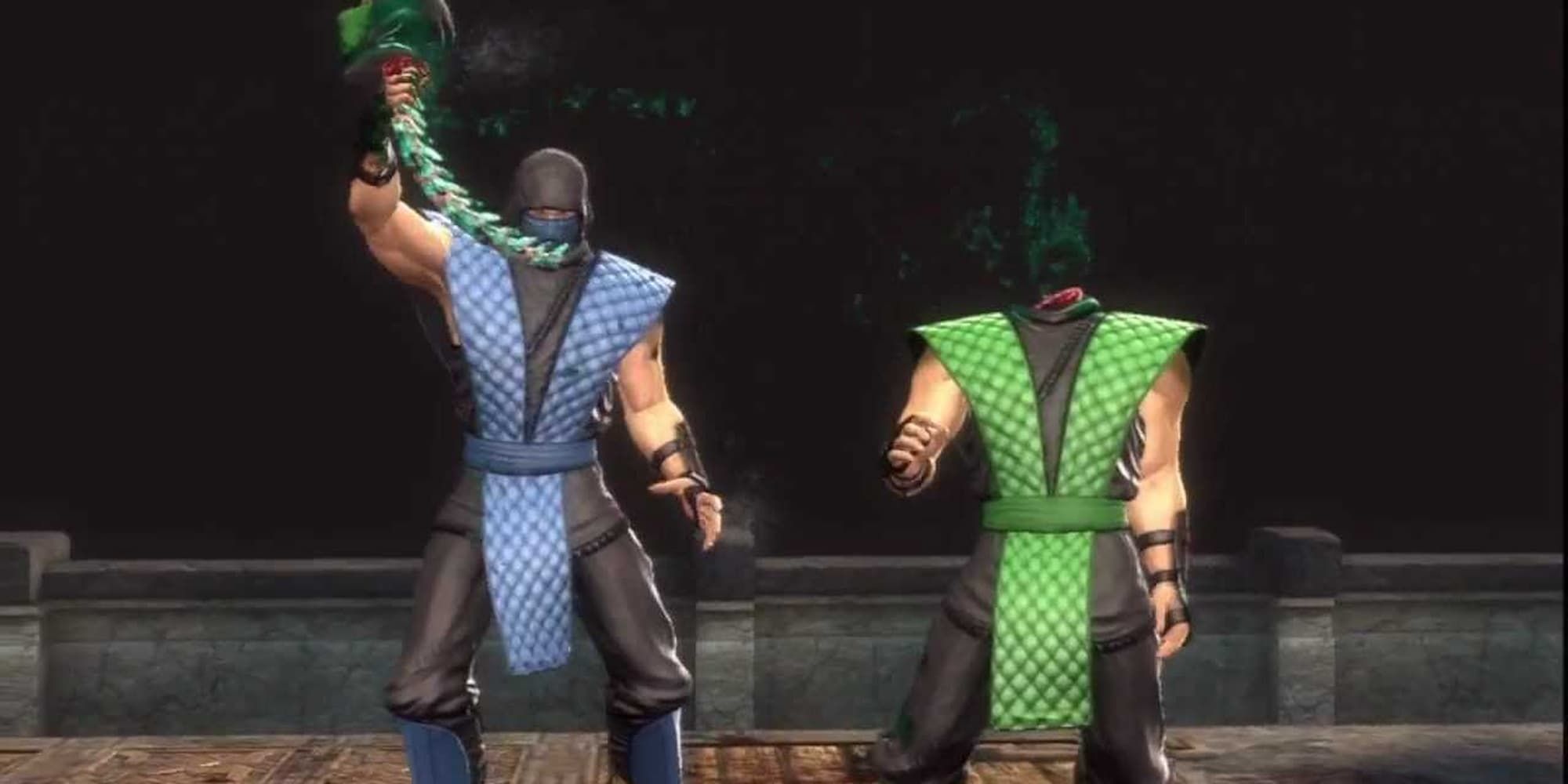 Sub-Zero holds his opponent's head and spine up high after performing one of his Fatality moves in Mortal Kombat 9.