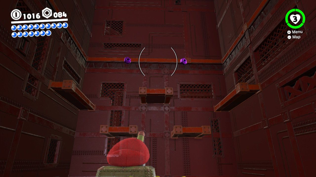 Mario capturing a tank in a bonus area of the Wooded Kingdom with purple coins in the air in Super Mario Odyssey.