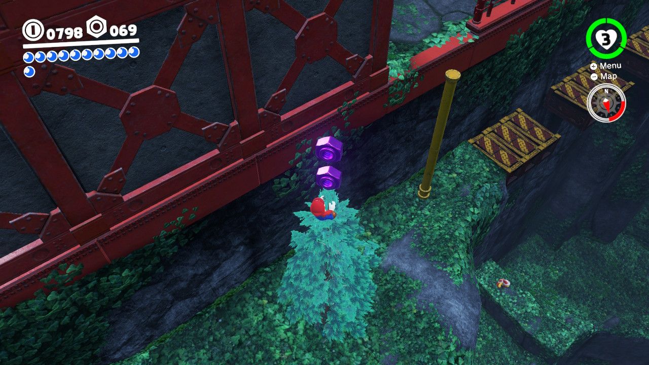 Mario climbing a tree with purple coins at the top in the Wooded Kingdom in Super Mario Odyssey.