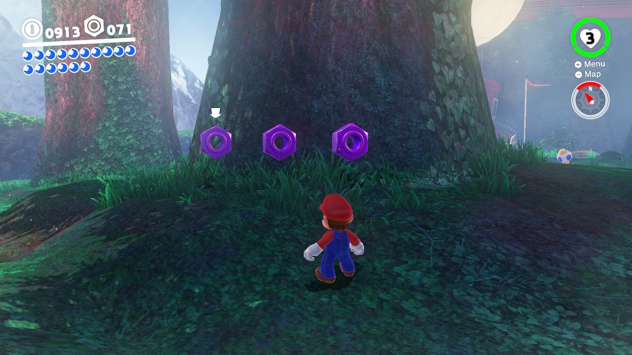 Mario standing next to a tree with purple coins nearby in the Wooded Kingdom in Super Mario Odyssey.