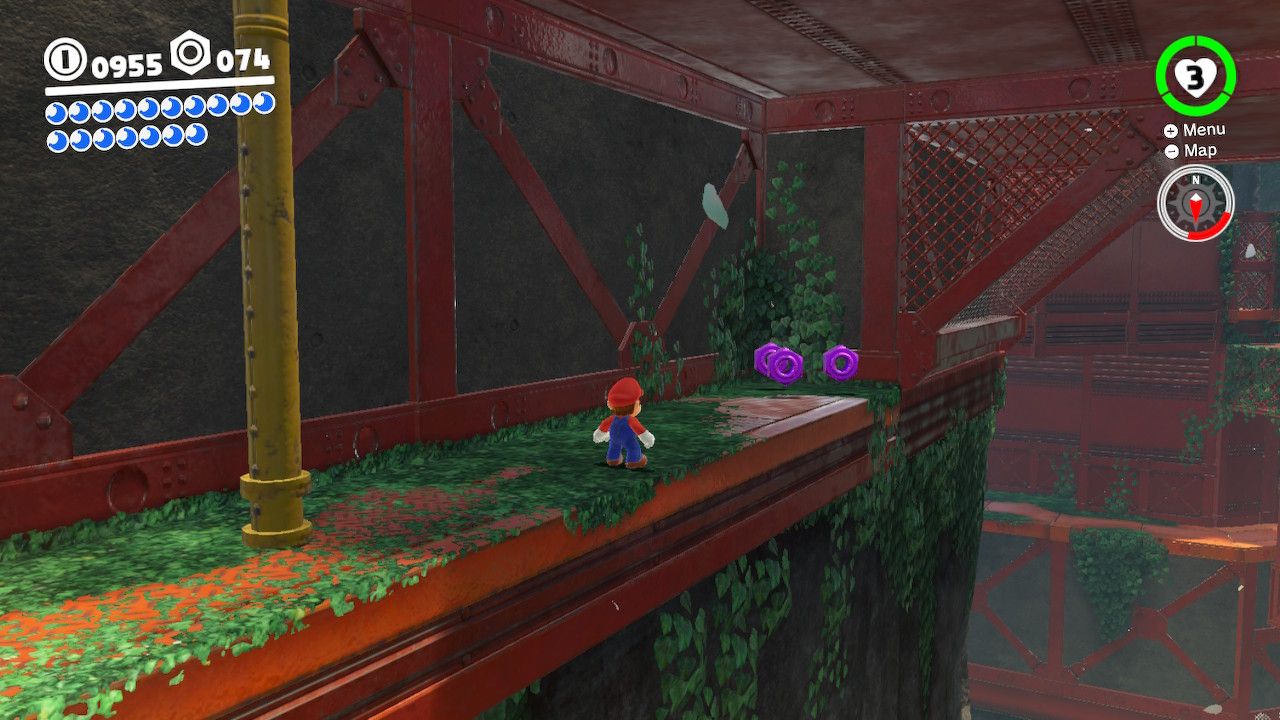 Mario on a metal platform with a yellow pull and purple coins nearby in the Wooded Kingdom in Super Mario Odyssey.