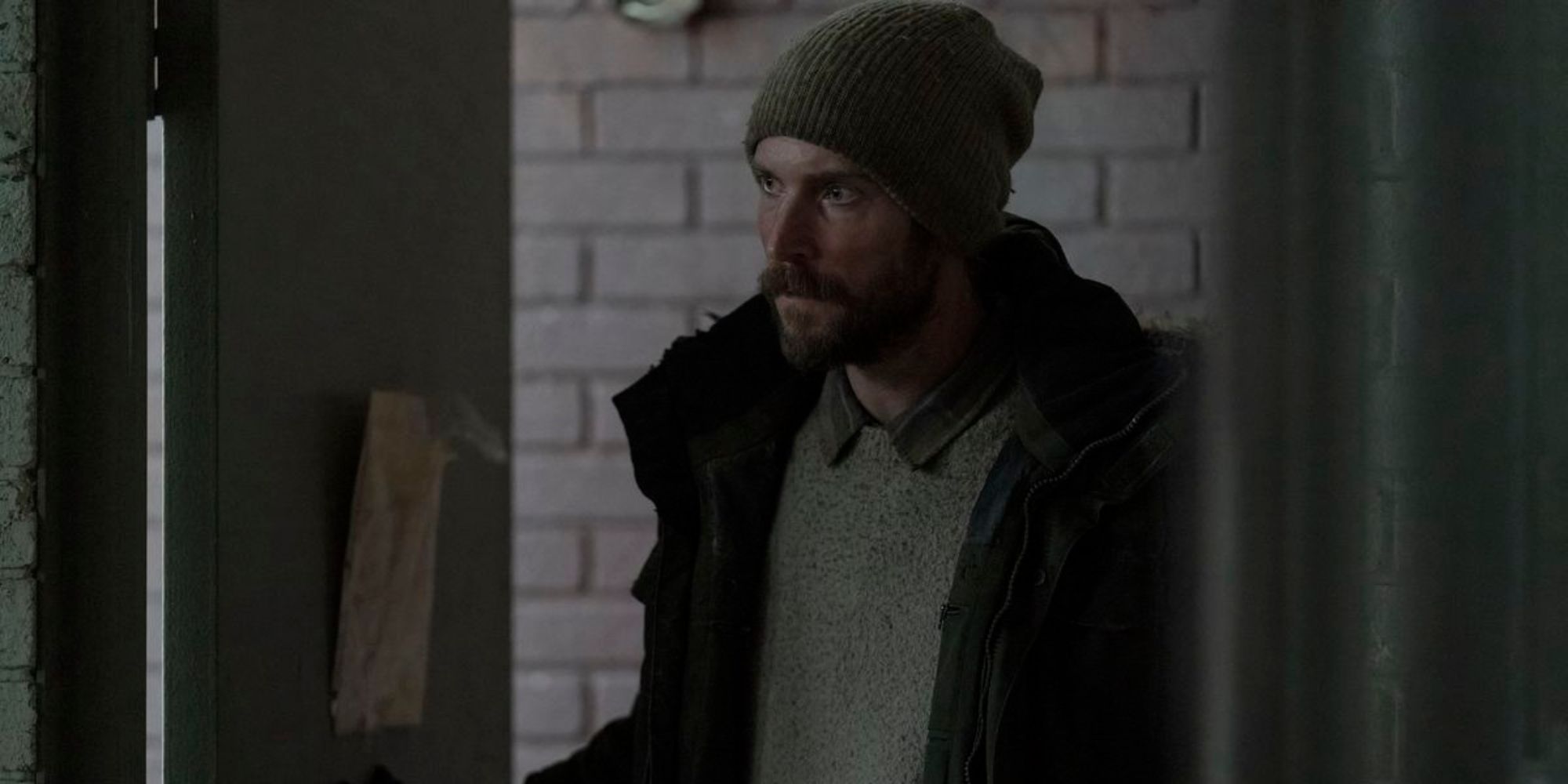 the last of us james wearing beanie and coat