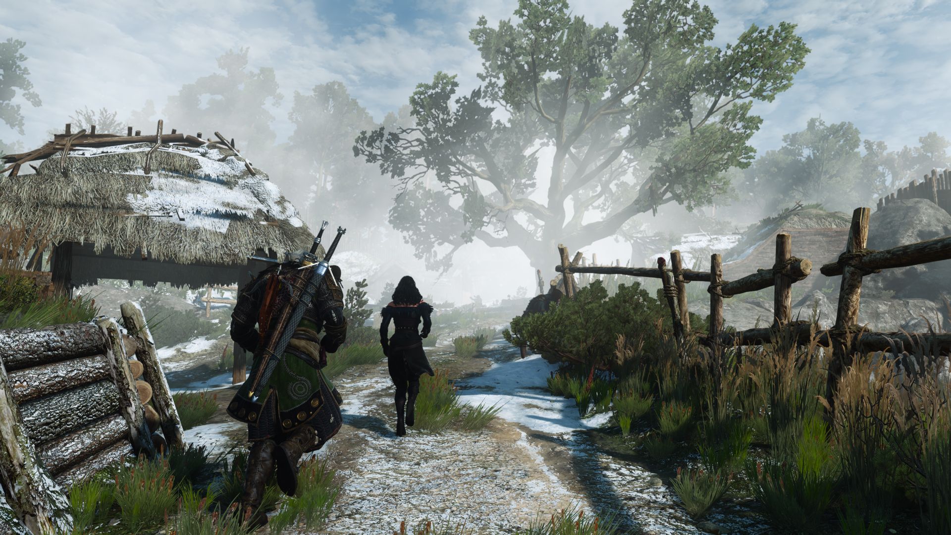 Geralt and Yennefer run into a frost-covered village in Skellige, with a large, imposing tree in the background.