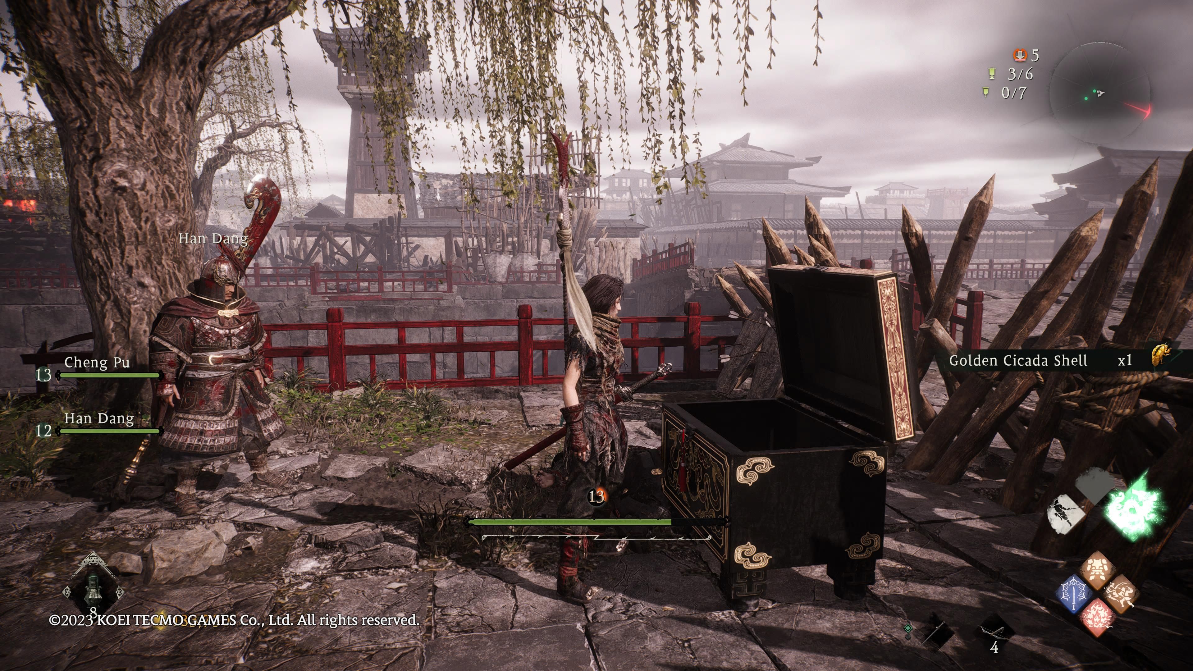 Wo Long: Fallen Dynasty - a treasure chest is opened next to some wooden stakes