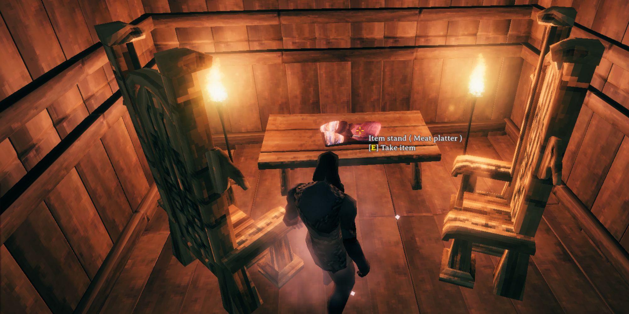 Valheim character in a Viking house in front of a Meat Platter