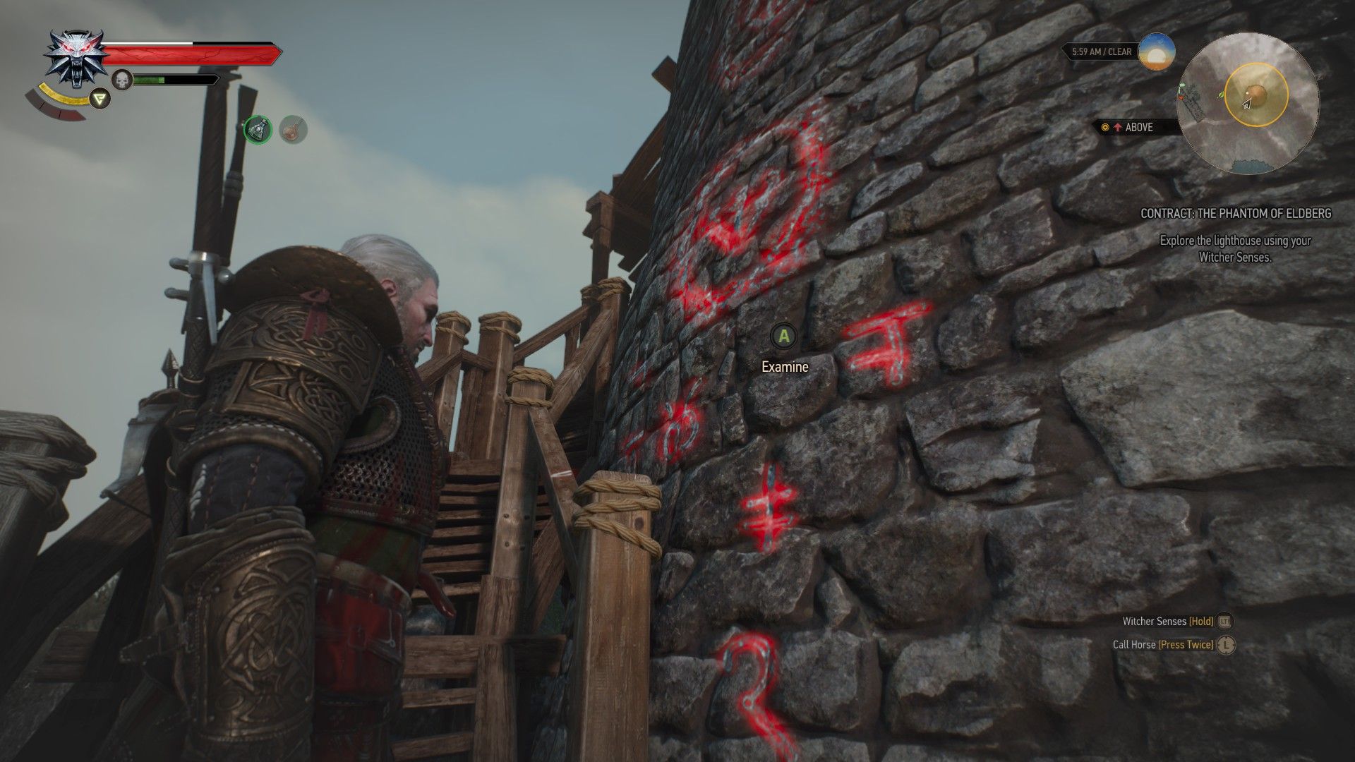 A screenshot of Geralt looking at runes etched into the stone wall of a lighthouse.