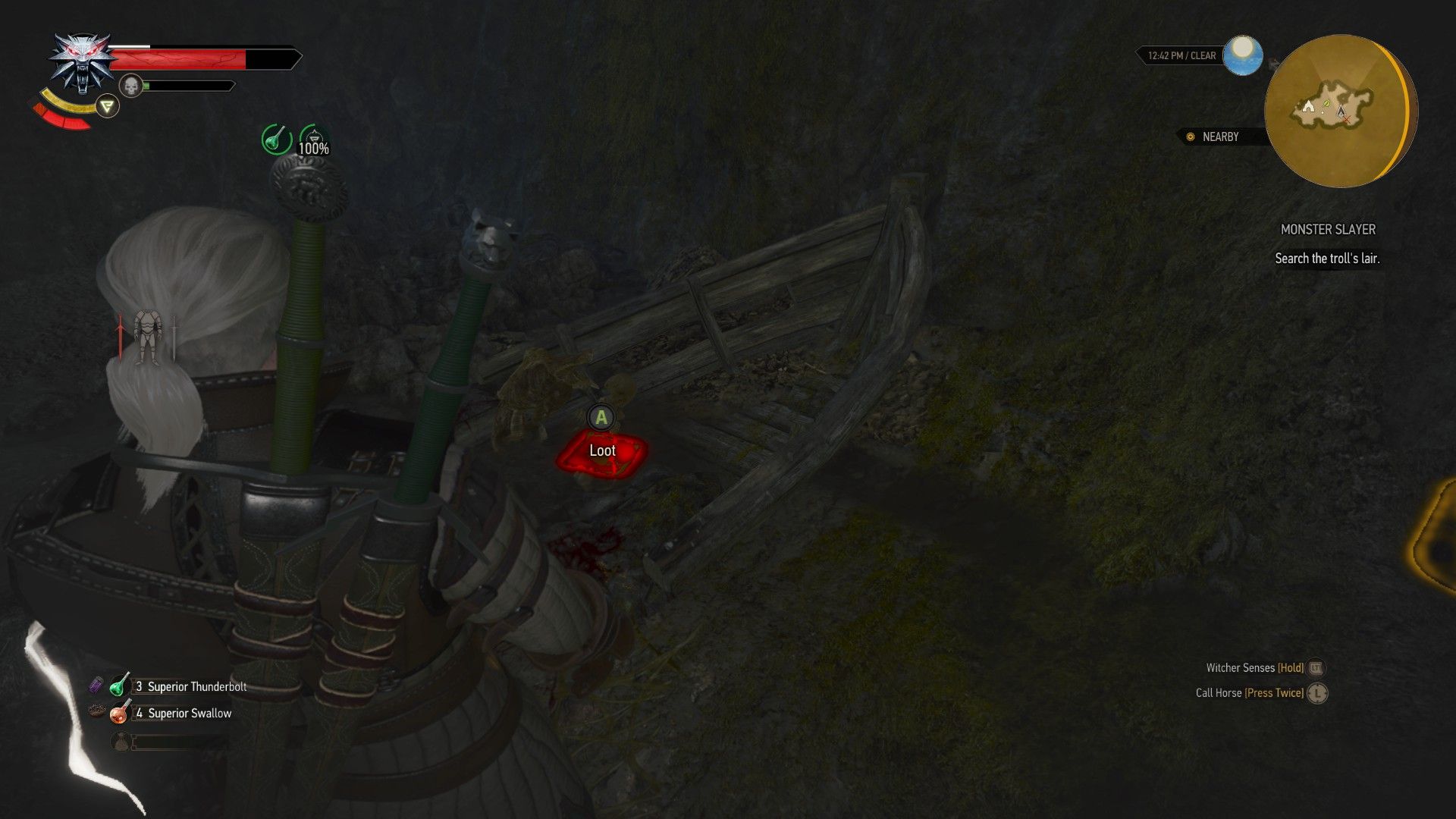 A screenshot of Geralt looking at a letter resting in a half-sunk boat inside a cave.