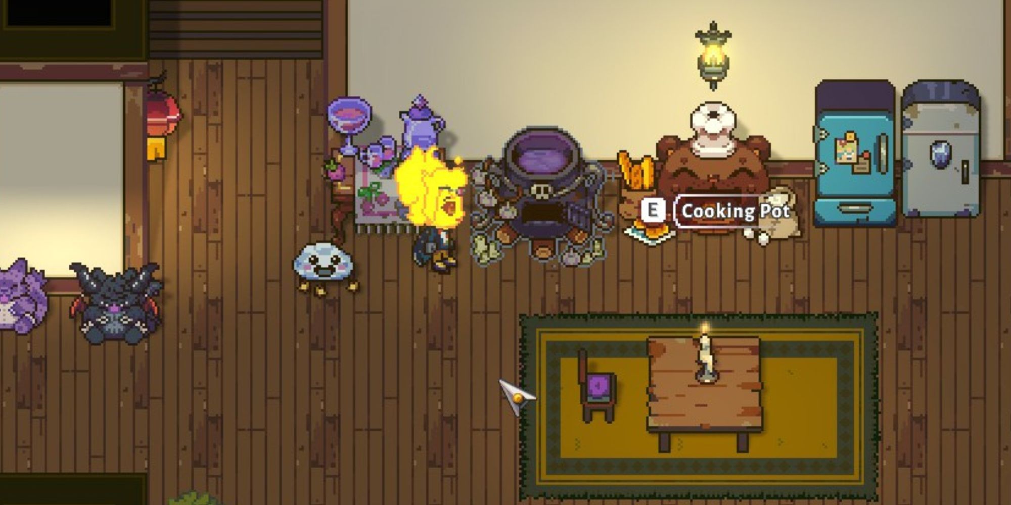 cooking pot placed in between juice maker and oven inside player home