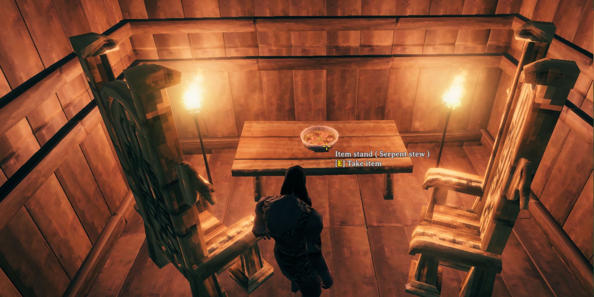Valheim character in a Viking house in front of Serpent Stew