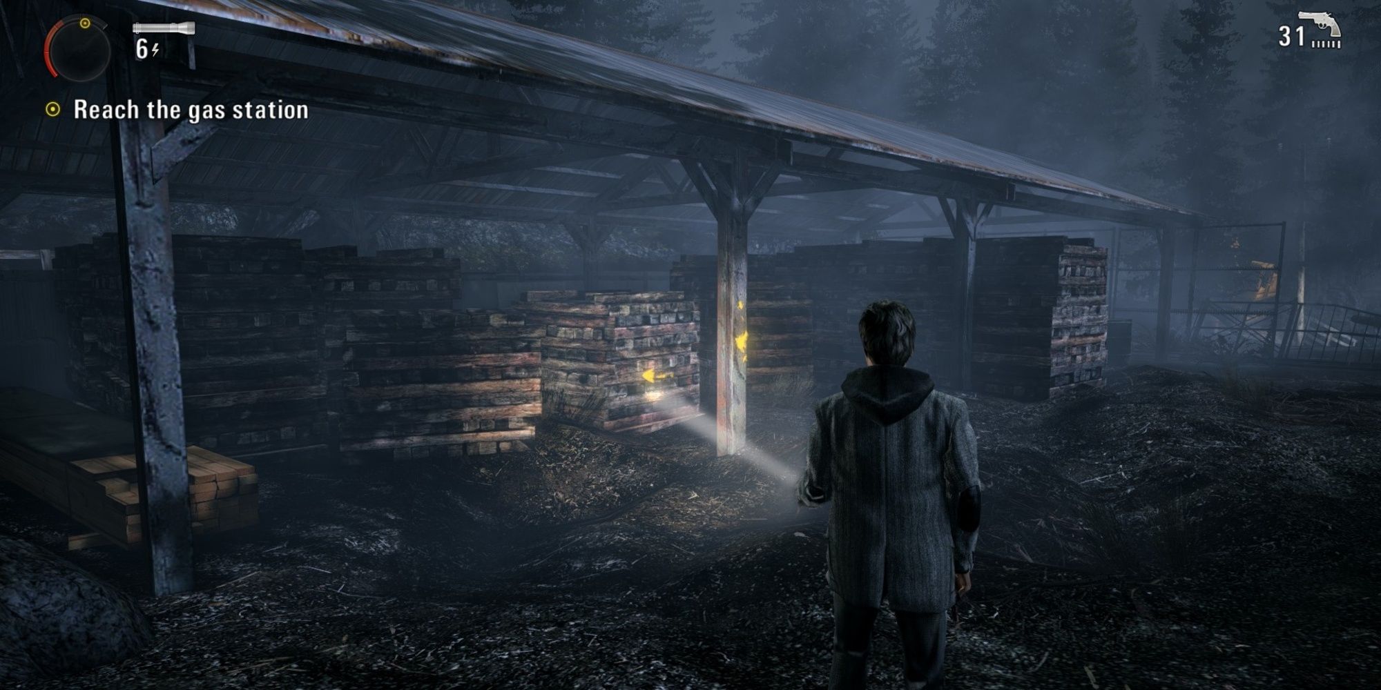 Alan Wake points a flashlight 