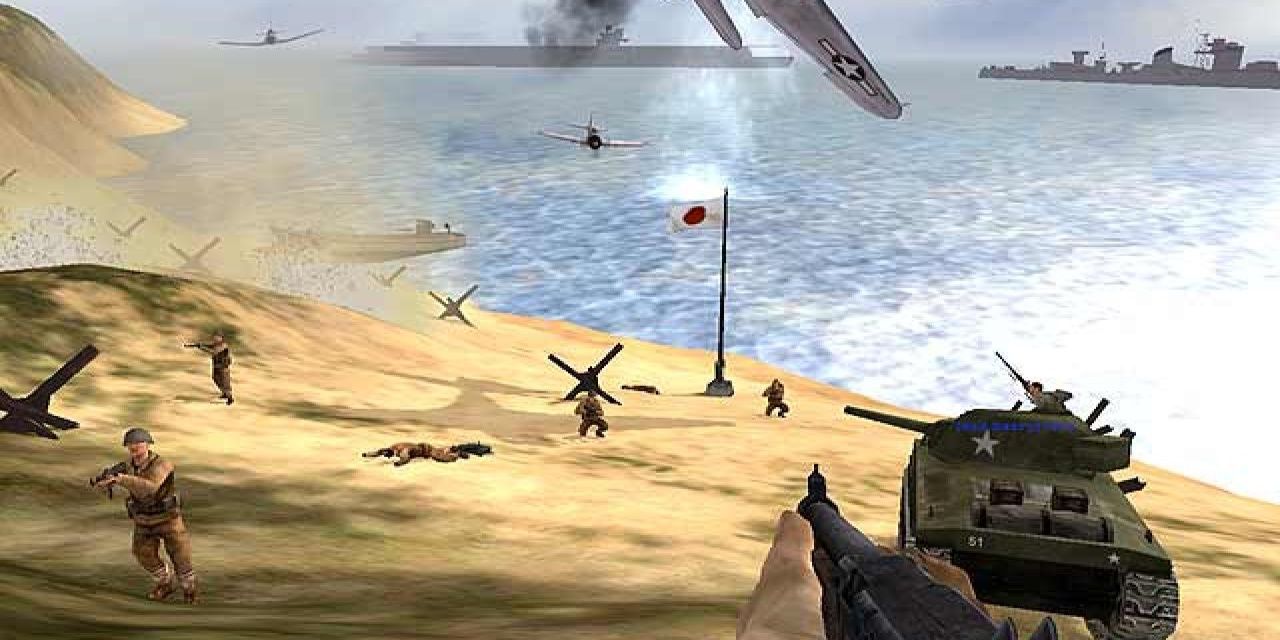 First person view of soldiers fighting on a beach in Battlefield 1942
