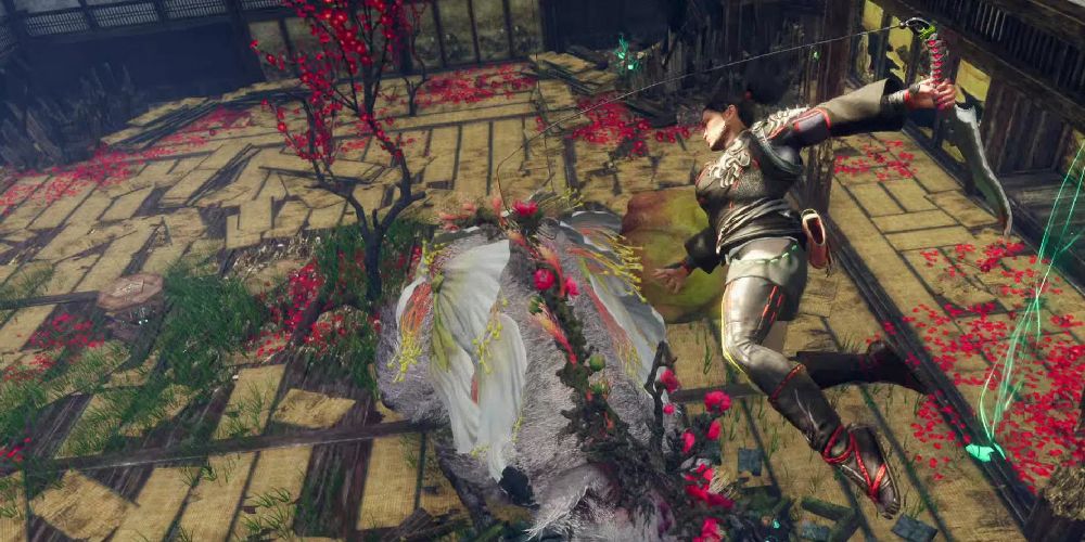 character attacking monster with claw blade in wild hearts