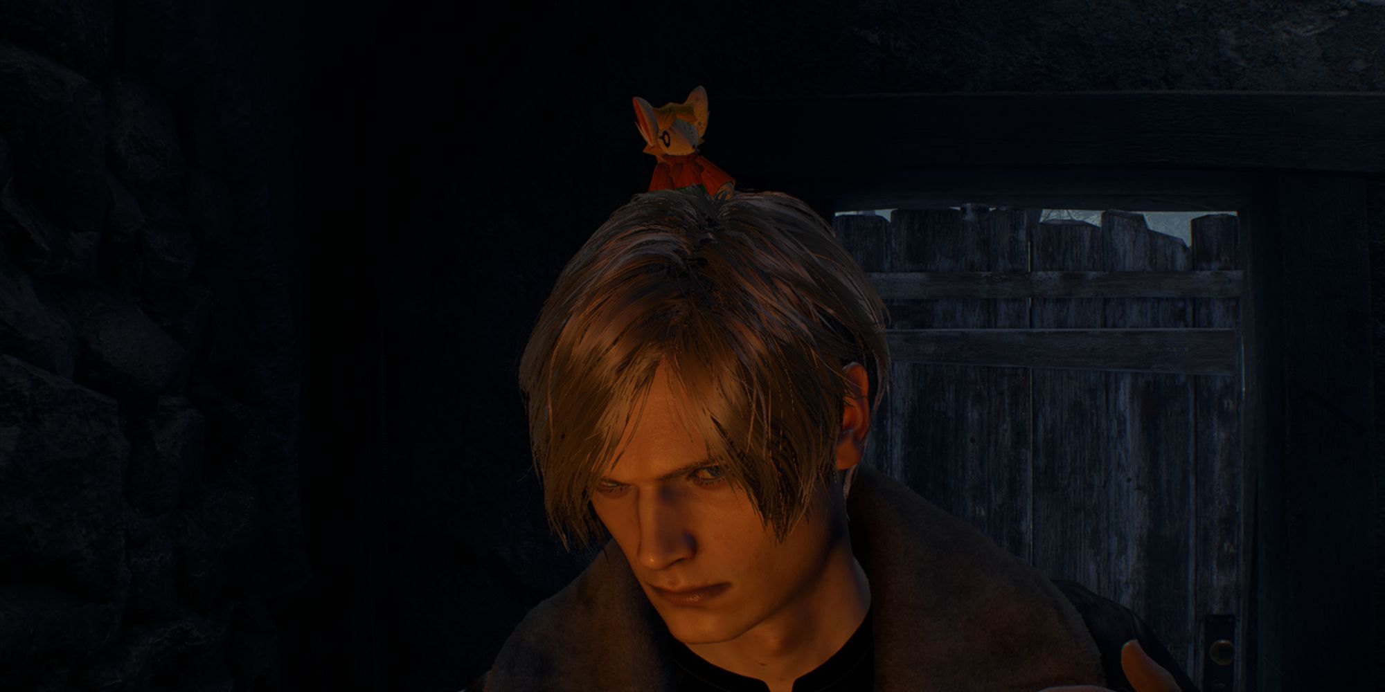 mouse ashley sitting on leon's head in resident evil 4 remake