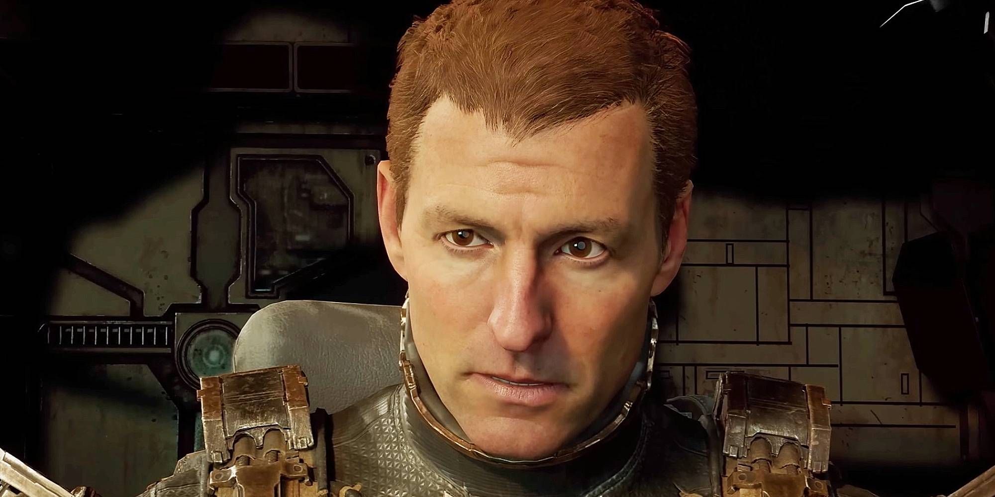A red haired middle aged man is in a spaceship looking concerned