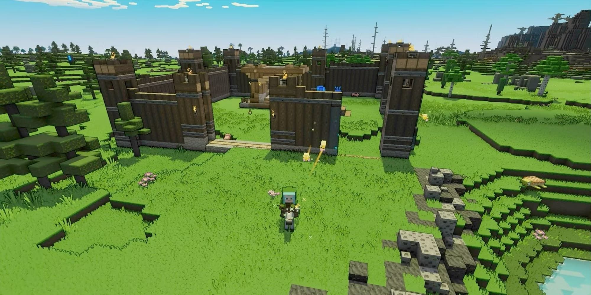 A player constructs a fort to defend in the multiplayer versus mode of Minecraft Legends.
