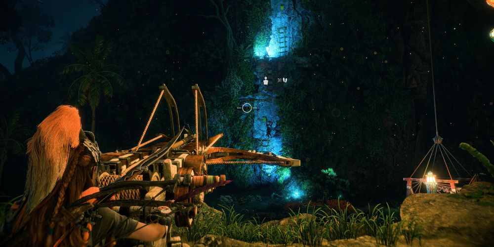 Aloy uses a ballista to create a climb point for Seyka in Horizon Forbidden West: Burning Shores