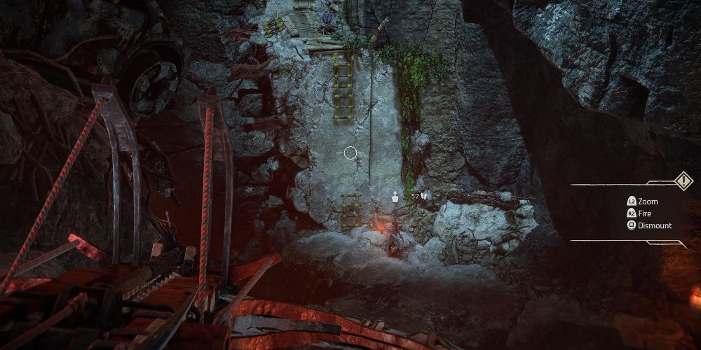 Aloy aims a ballista in the lava caves while Seyka waits below in Horizon Forbidden West Burning Shores