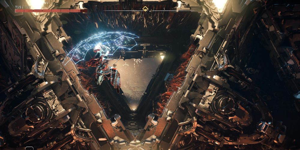 Aloy glides through the entrance to the core chamber in Cauldron THETA in Horizon Forbidden West: Burning Shores