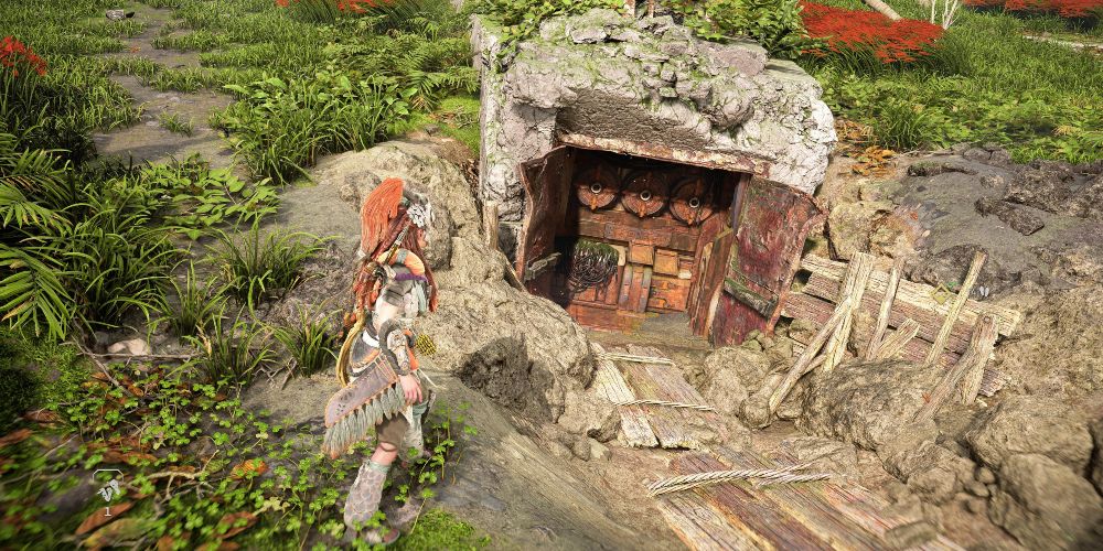 Aloy finds Londra's transmitter under a statue in Horizon Forbidden West Burning Shores